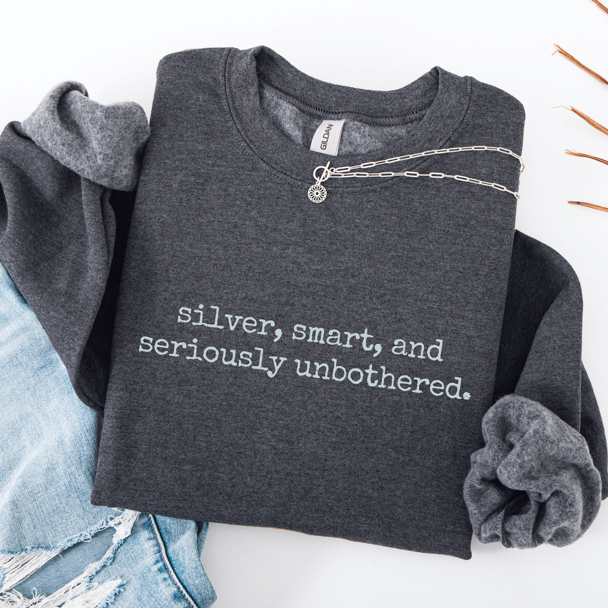silver, smart & seriously unbothered. Crewneck
