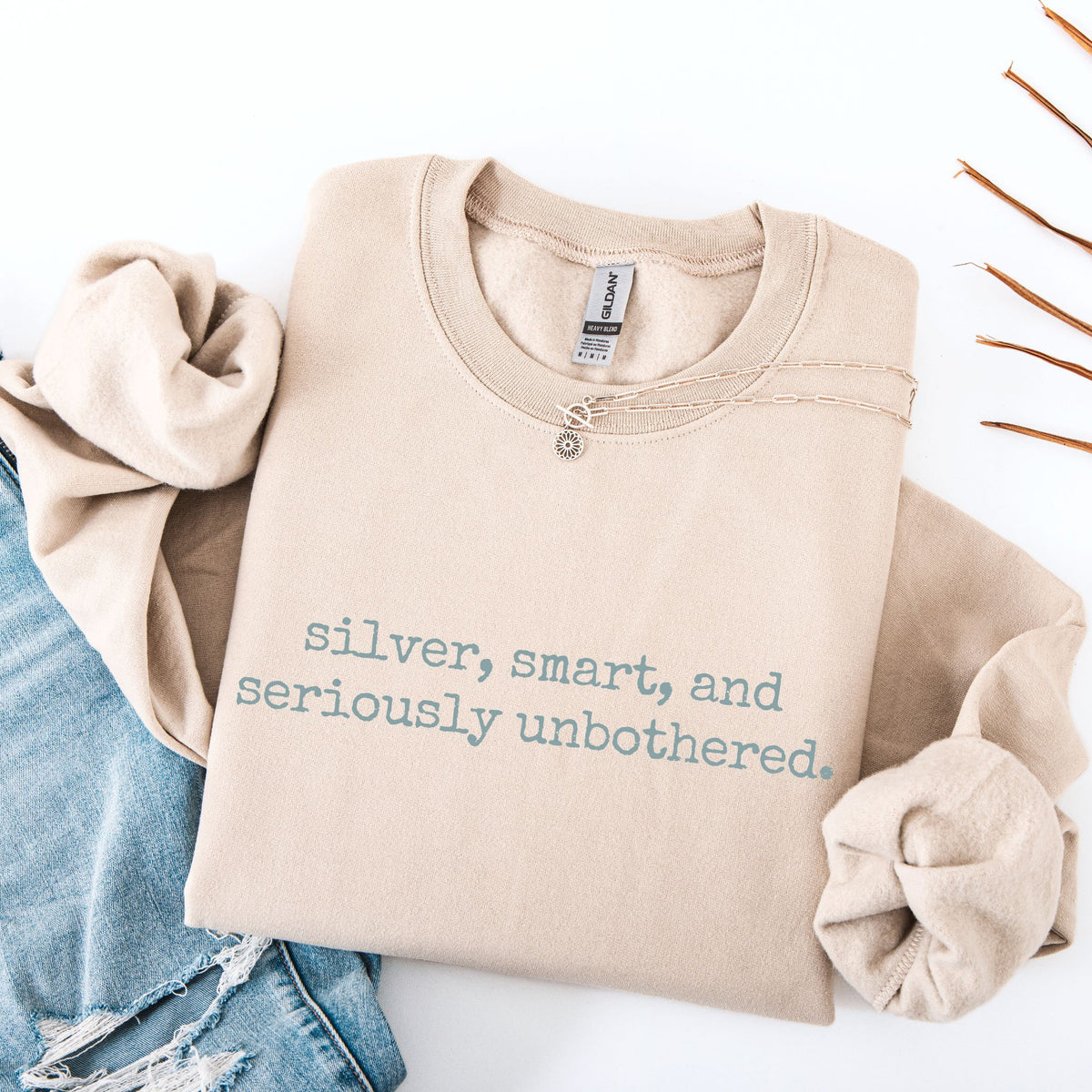 silver, smart & seriously unbothered. Crewneck